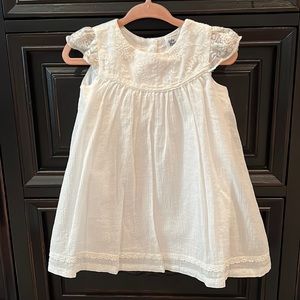 Like new… The sweetest white dress with amazing detail.